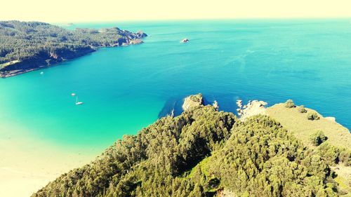High angle view of bay against clear sky
