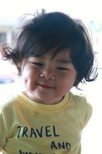 Close-up portrait of smiling boy