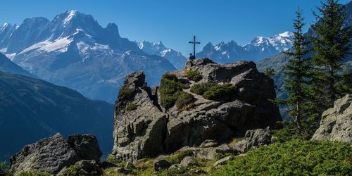 Scenic view of rocky mountains against clear blue sky