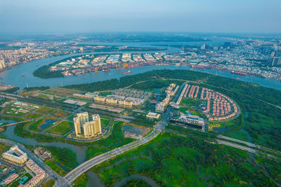 High angle view of buildings in city against sky