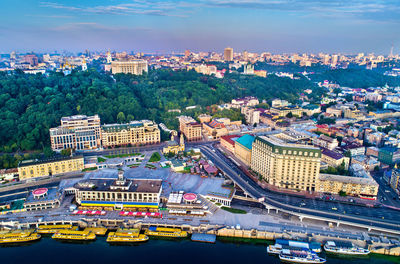 High angle view of buildings and city against sky