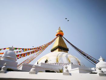 Low angle view of traditional building against clear sky