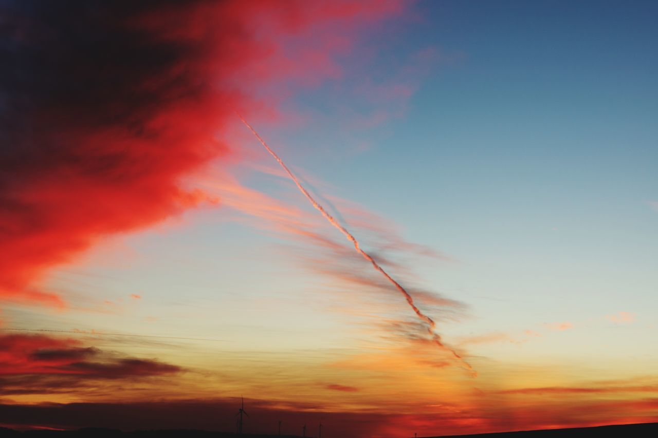 sunset, sky, cloud - sky, beauty in nature, orange color, scenics - nature, tranquility, tranquil scene, low angle view, nature, no people, silhouette, dramatic sky, idyllic, outdoors, red, vapor trail, non-urban scene, majestic, awe, romantic sky