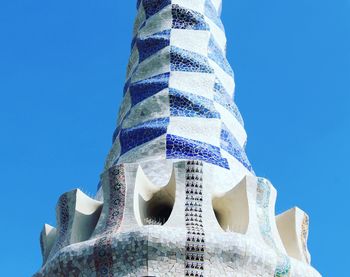 Low angle view of statue against clear blue sky