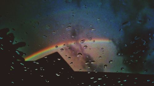 Close-up of rain drops on glass window