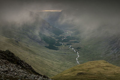 Aerial view of landscape and mountains against sky