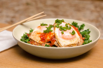 Close-up of salad in bowl on table