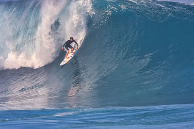 Man surfing in sea