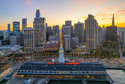 High angle view of city at sunset