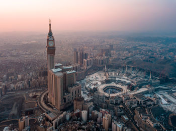 High angle view of city buildings during sunset