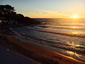 Scenic view of sea against sky during sunset, view from the hotelgarden on the beach 