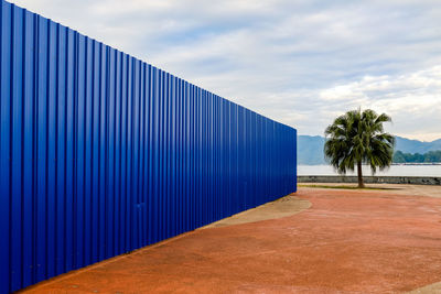 Corrugated iron against blue sky