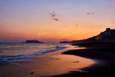 Scenic view of sea against sky during sunset