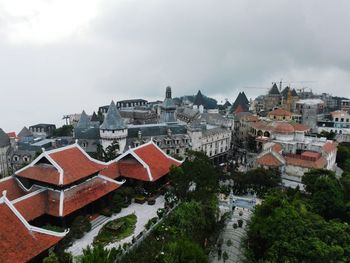 High angle view of houses against sky