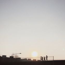 Men on road against sky