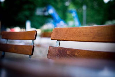 Close-up of empty bench on table