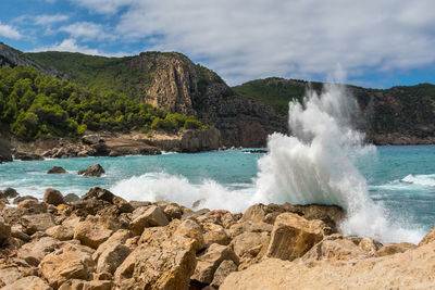 Scenic view of sea at cala d'albarca, ibiza