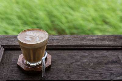 Close-up of coffee cup on table