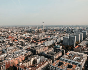 Aerial view of buildings against sky in city