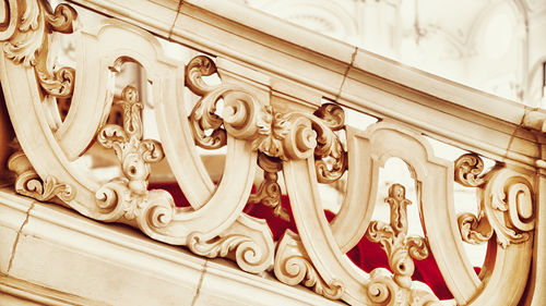 Low angle view of sculpture on wall