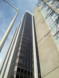 Low angle view of modern building against sky