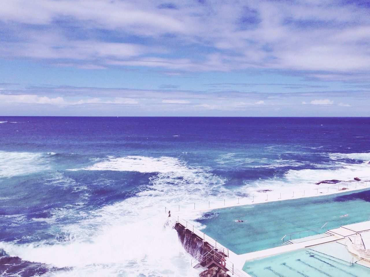 sea, water, horizon over water, wave, surf, sky, scenics, beach, beauty in nature, blue, nature, shore, cloud - sky, tranquil scene, motion, tranquility, idyllic, seascape, day, vacations