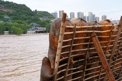 View of rusty ship against sky