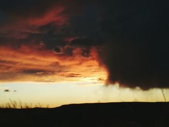 Scenic view of dramatic sky during sunset