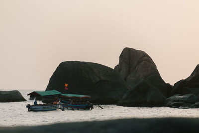 Scenic view of beach against clear sky