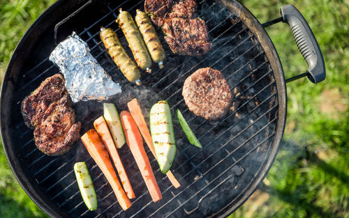 Directly above shot of vegetables on barbecue