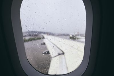 Cityscape seen through airplane window