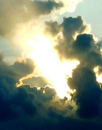 Low angle view of cloudy sky at sunset