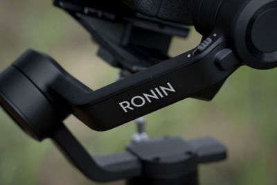 Close-up of camera sign on metal