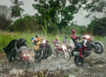 Group of people riding motorcycle