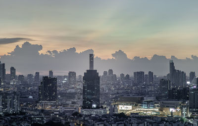 Cityscape against sky during sunset