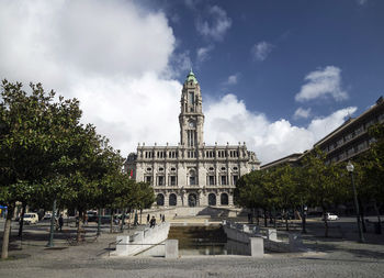 Facade of historic building against sky