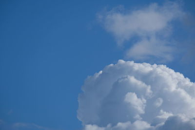 Low angle view of clouds in blue sky