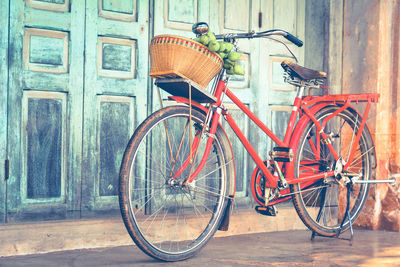 Bicycle parked in against building