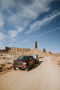 Car on road along desert