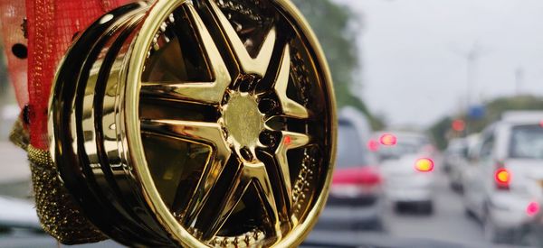 Close-up of vintage car on street