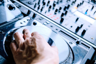 Close-up of cropped hand turntable