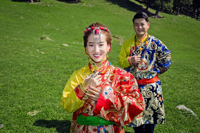 Portrait of people wearing traditional clothing