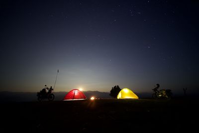 Scenic view of sea against sky at night