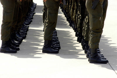 Low section of soldiers standing in row