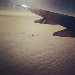 Cropped image of airplane wing