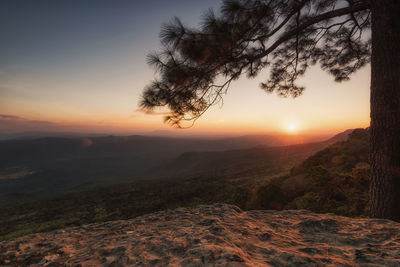 Scenic view of landscape against sky during sunset
