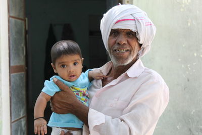 Portrait of father with son