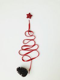 Close-up of christmas decoration against white background