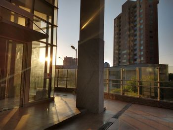 Buildings against sky during sunset