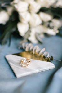 Diamond rings and wedding rings. on the blue background.